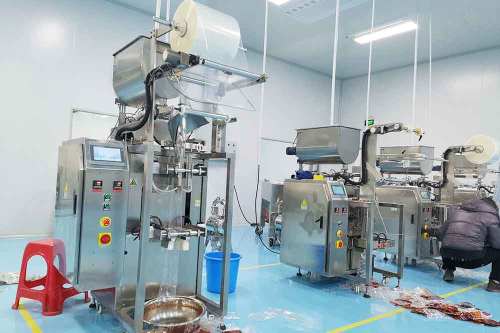 全自動(dòng)火鍋底料包裝機(jī)用于火鍋料、豆瓣醬、辣椒醬等等產(chǎn)品包裝